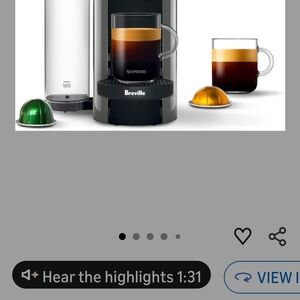 Breville Nespresso Coffee Maker with Black and Silver Accents